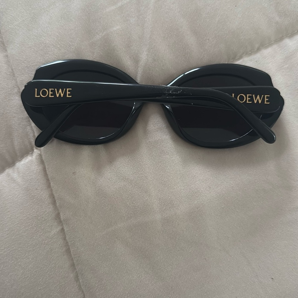 Loewe sunglasses. Black sunglasses. Gold logo